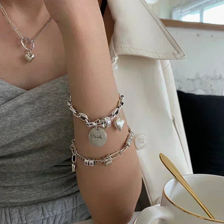 Unisex punk silver cuff bracelet, an edgy metal fashion statement. Bold accessory for rock and alternative styles.