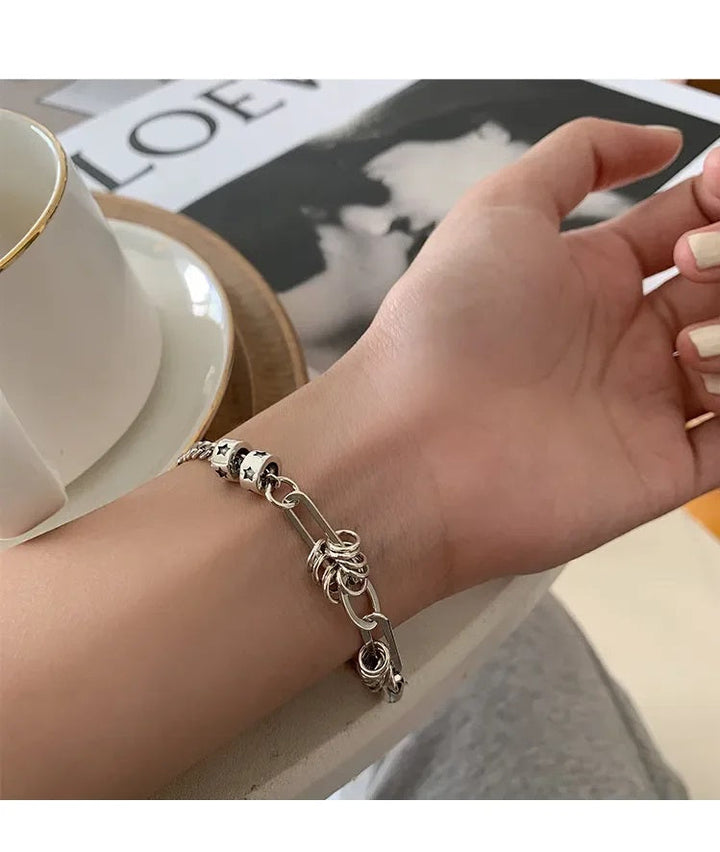 Punk Passion silver cuff bracelet, a bold unisex accessory. Edgy metal jewelry, perfect gift for fashion enthusiasts.