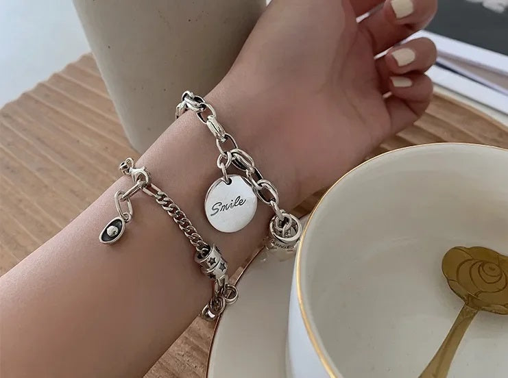 Unique silver punk cuff bracelet, a bold fashion statement. Unisex edgy metal jewelry for a distinctive and modern look.