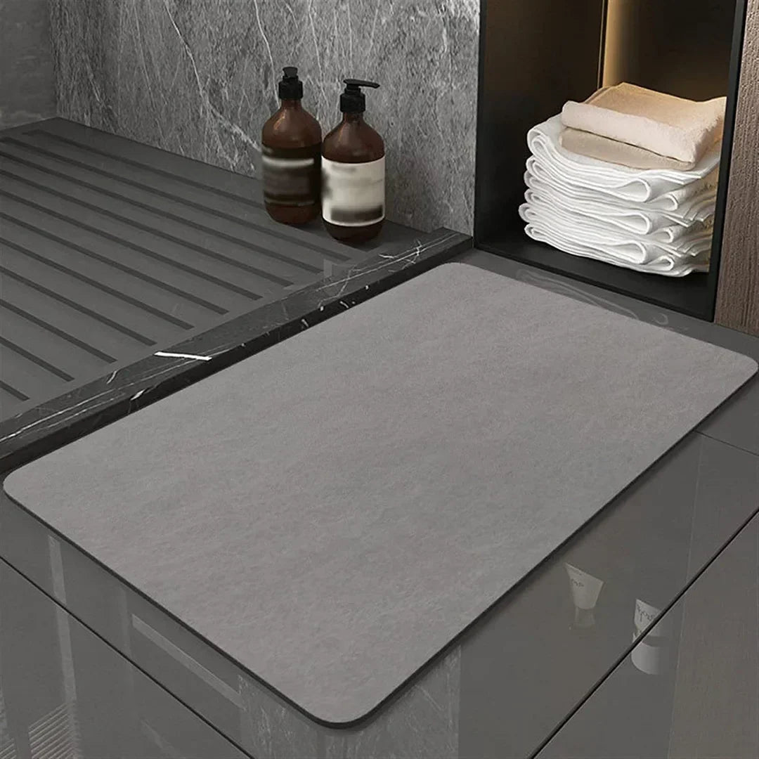 Close-up of a natural diatomite bath mat texture, showing its quick-drying and absorbent surface.