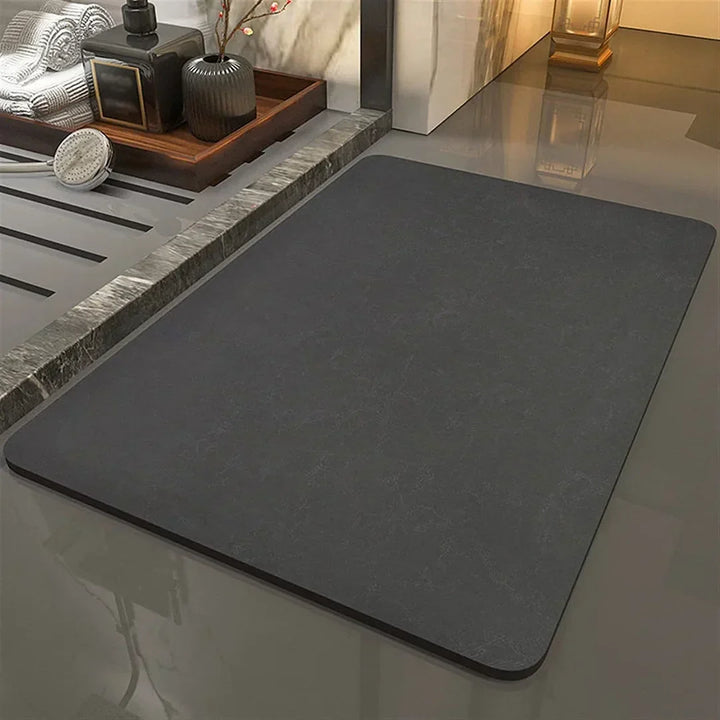 Highly absorbent quick dry diatomite mat, ideal for keeping bathroom floors clean and dry after showers.