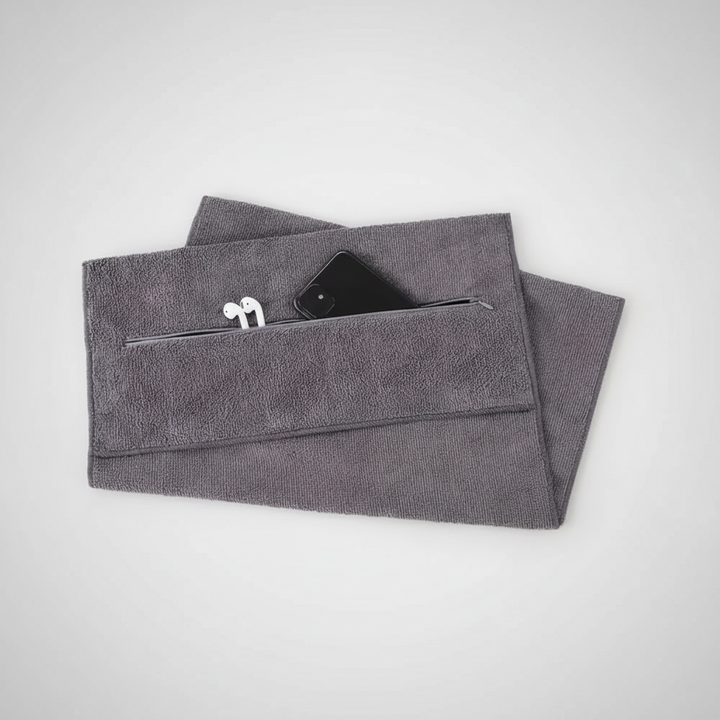 Compact microfiber sweat towel for gym, featuring a convenient and discreet zipper pocket.
