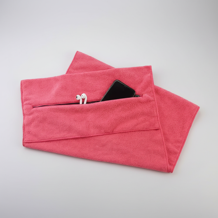 Fitness gear: ultra-absorbent gym towel with zippered pocket to hold essentials.