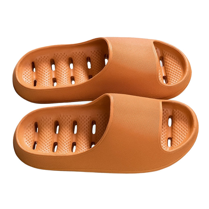 Easy-wear unisex home slippers; quick-dry bathroom sandals with drainage holes for ultimate comfort.