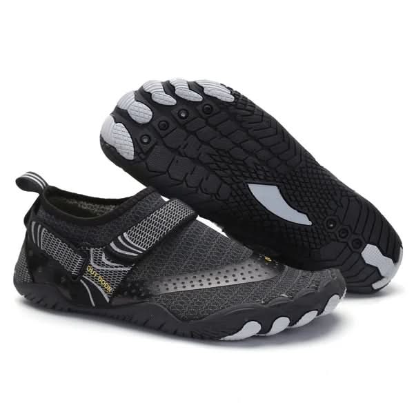 Assortment of colorful unisex aqua shoes, ideal for beach, swimming, & various water sports.