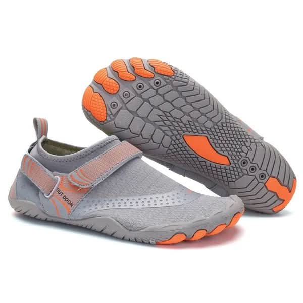 Unisex swim shoes in shallow water, quick-dry and flexible for aqua sports & barefoot beach walking.