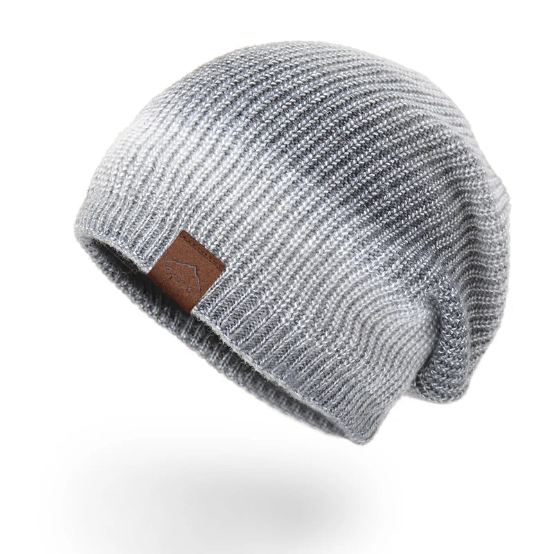 Unisex Rainbow Knit Beanie Hat: a soft, warm, and colorful accessory for winter fashion.
