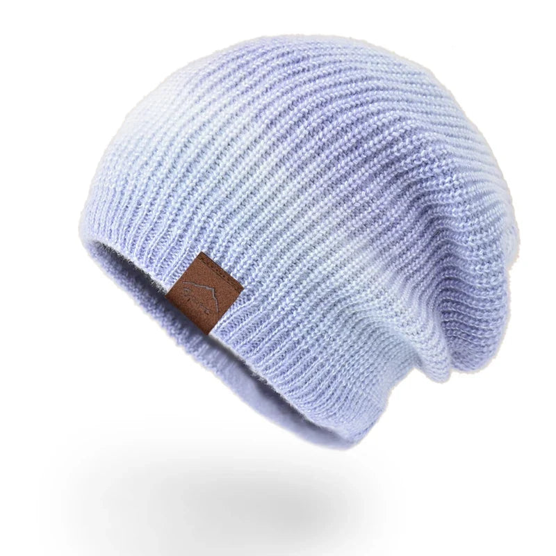 Warm knit rainbow beanie hat. Unisex, colorful, soft, and fashionable for winter.