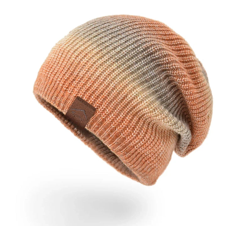Bright rainbow knit beanie hat, essential winter accessory. Unisex, warm, soft, and fashionable.