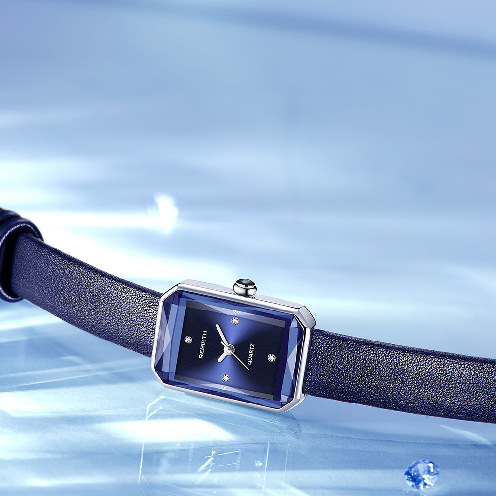 Unisex rectangular classic watch enhancing a professional outfit, an elegant wrist accessory.