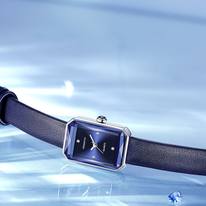 Unisex rectangular classic watch enhancing a professional outfit, an elegant wrist accessory.
