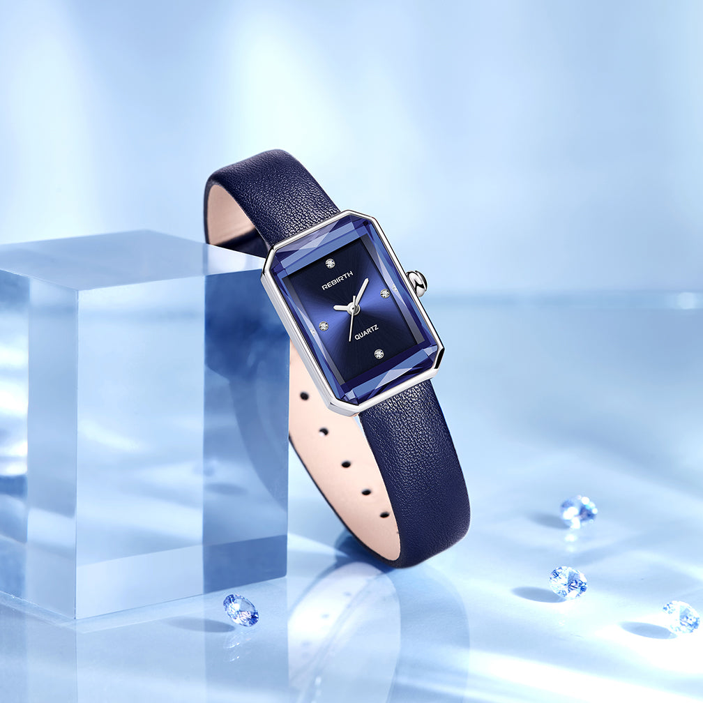 Brown genuine leather strap of a classic rectangular wristwatch, a durable and stylish accessory.
