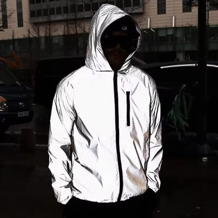 Durable unisex waterproof hiking rain jacket with reflective accents, perfect outdoor gear for all weather.