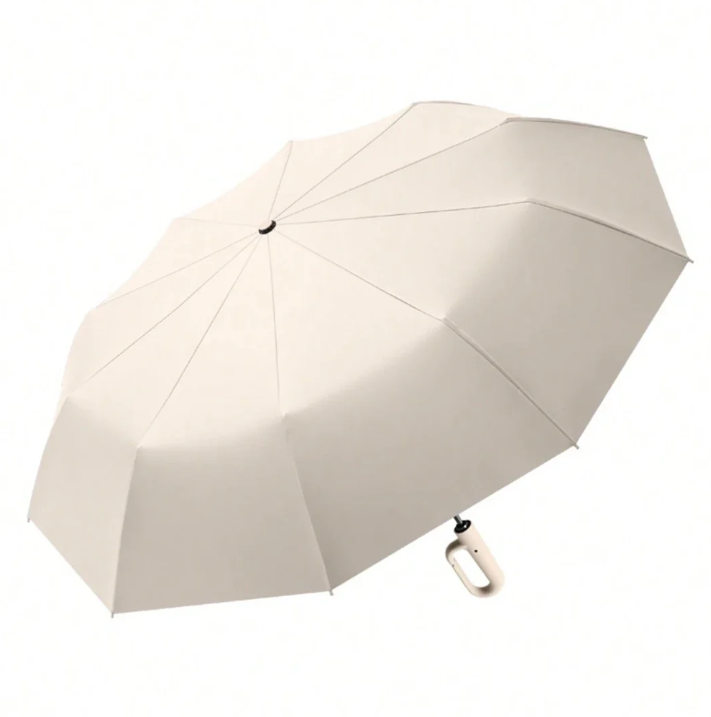 Compact AeroGlow reflective storm umbrella, closed, with strap, ideal for travel and rain gear