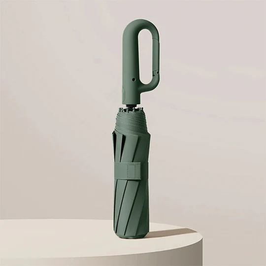 Compact reinforced unisex travel umbrella, offering superior windproof protection from both rain & sun.