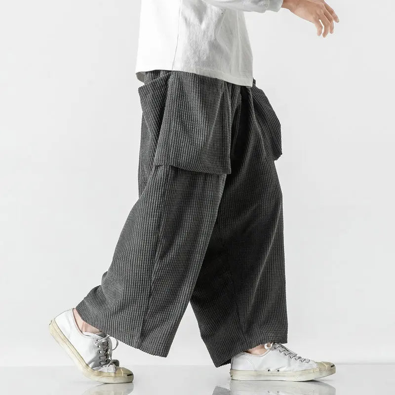 Relaxed fit unisex sweatpants in soft fabric, featuring a comfortable straight leg and drawstring waist.