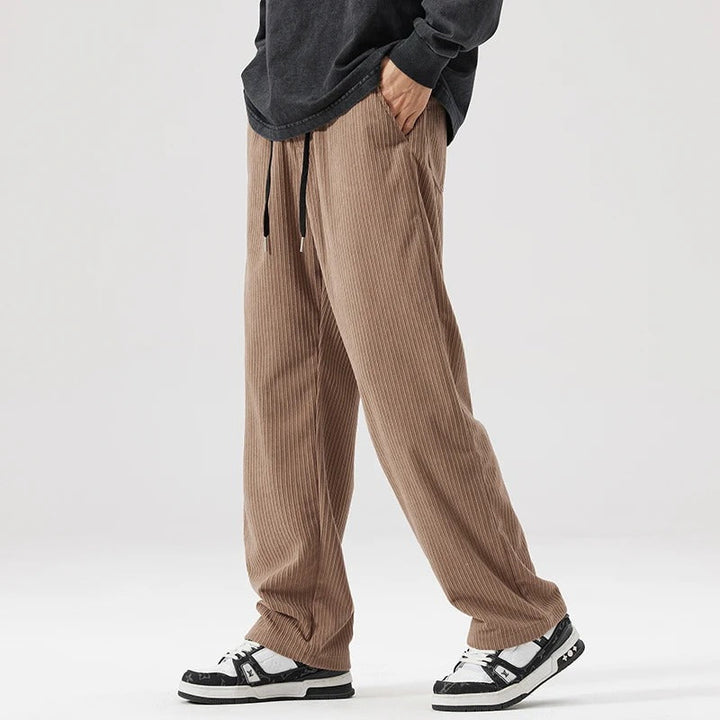 Comfortable wide leg corduroy pants with drawstring waist, perfect unisex casual apparel.