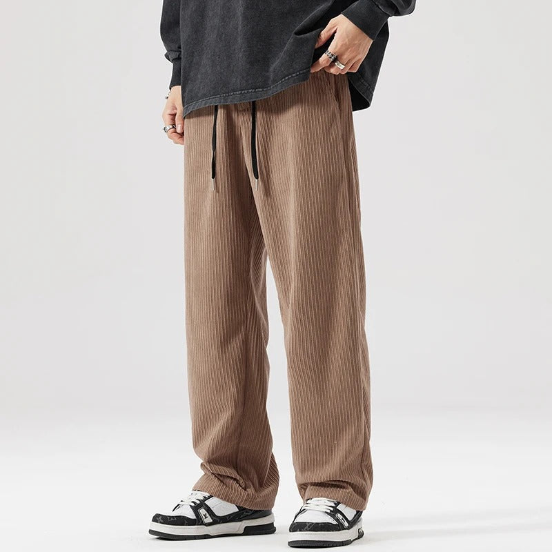 Soft breathable corduroy pants, unisex relaxed fit, ensuring all-day comfort and style.