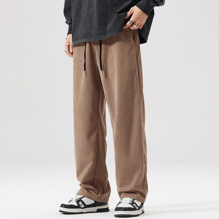 Soft breathable corduroy pants, unisex relaxed fit, ensuring all-day comfort and style.