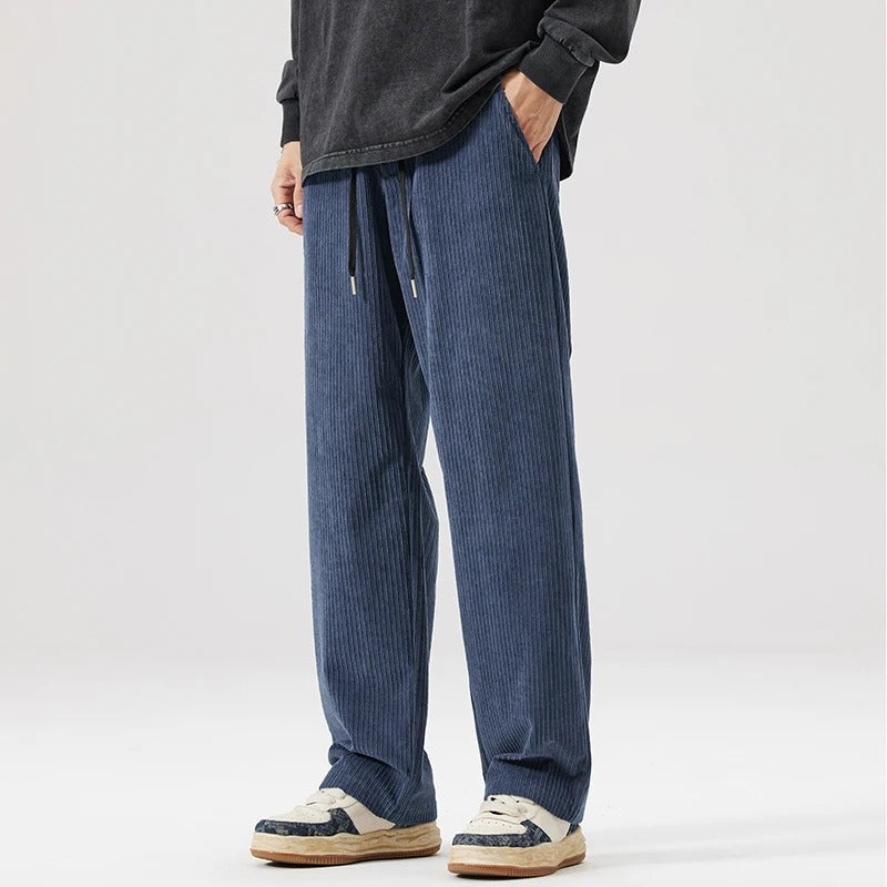Casual wide leg corduroy pants with a relaxed fit, unisex design for comfortable everyday style.