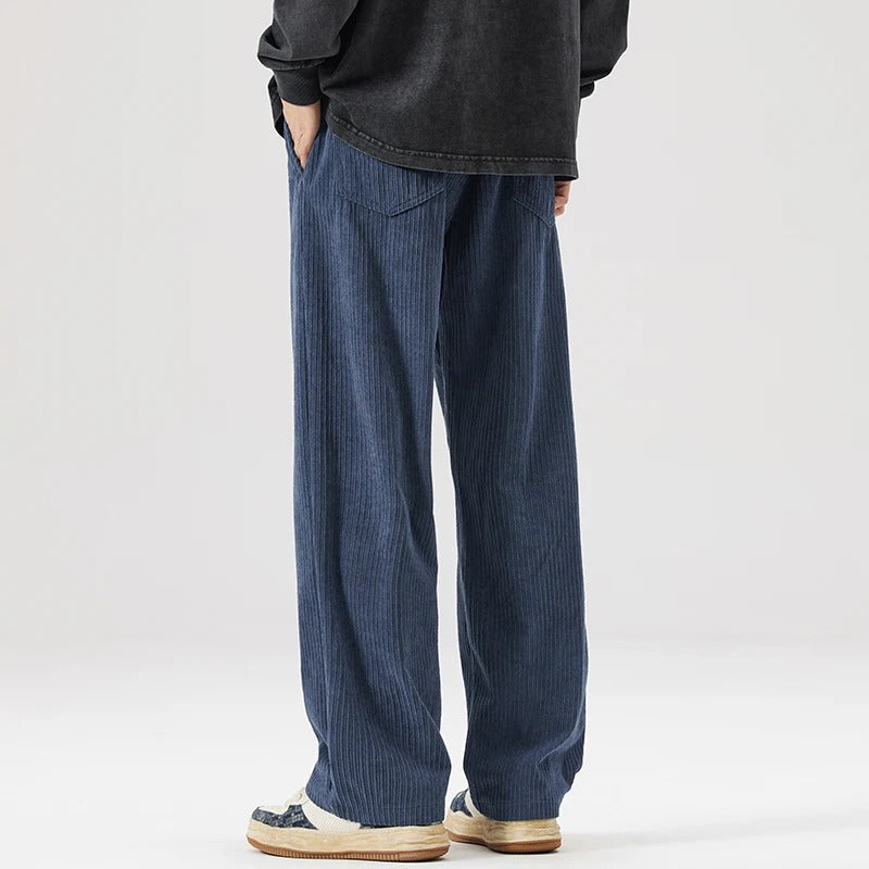Versatile unisex relaxed fit corduroy pants, soft & comfortable for casual wear.