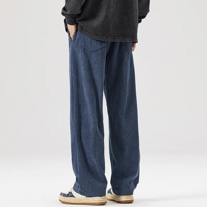 Versatile unisex relaxed fit corduroy pants, soft & comfortable for casual wear.