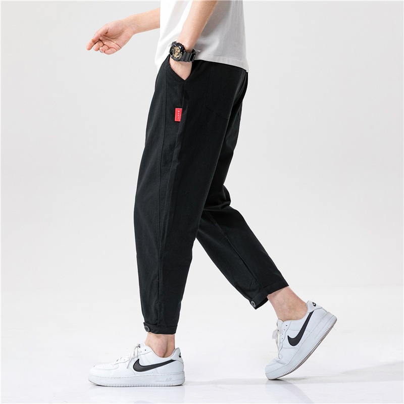Comfortable, breathable linen blend trousers for unisex casual style. Relaxed fit pants, perfect for summer comfort.