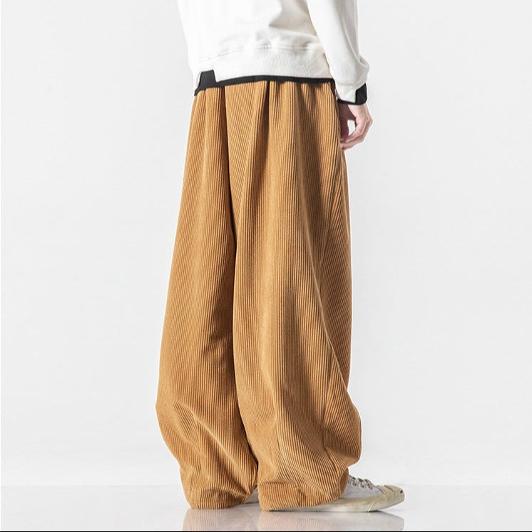 Grey unisex comfortable lounge pants, relaxed fit with elastic waist for daily wear.