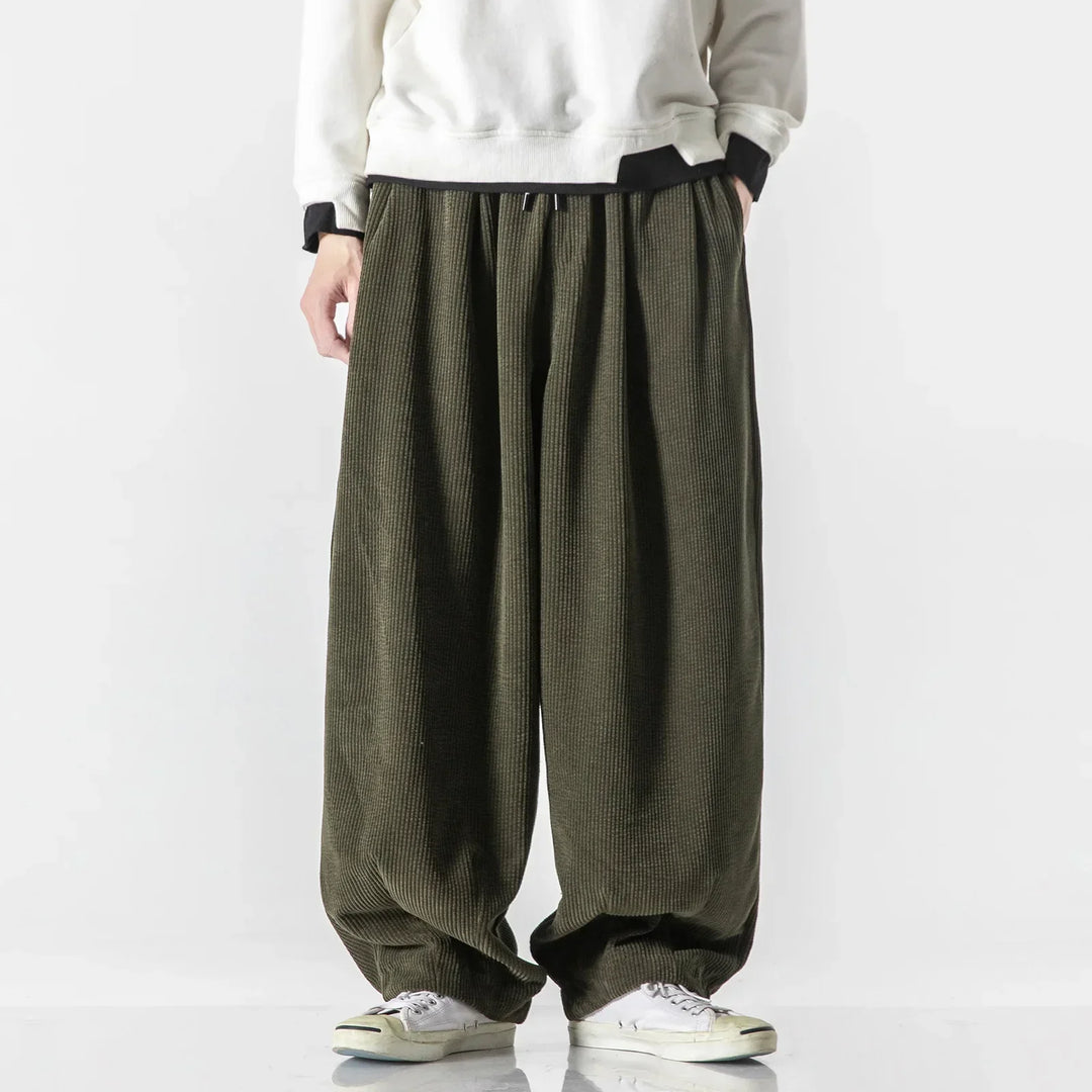 Army green relaxed fit casual pants, unisex design, comfy athleisure wear with drawstring.