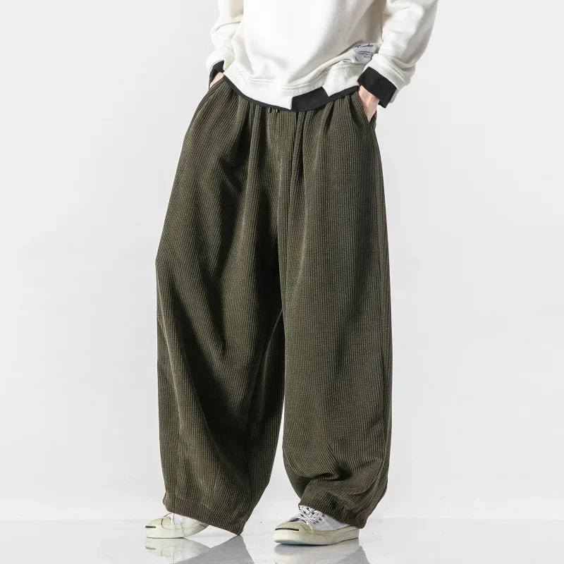 Comfortable relaxed fit sweatpants, unisex design for stylish daily wear or lounging.