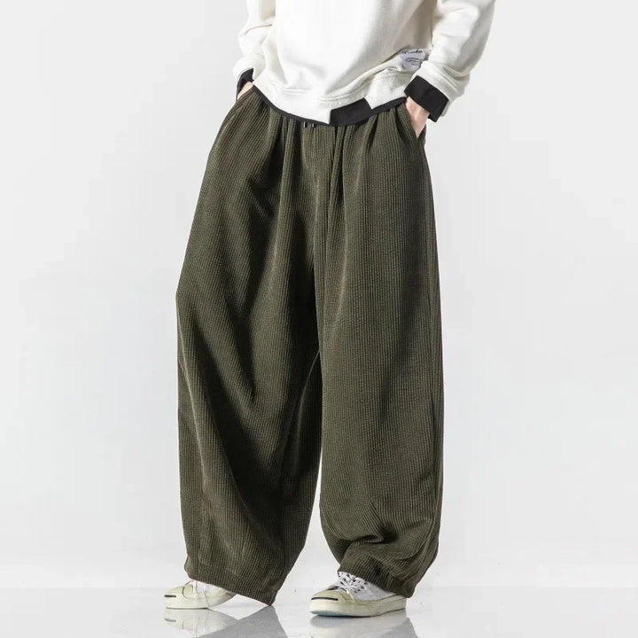 Comfortable relaxed fit sweatpants, unisex design for stylish daily wear or lounging.