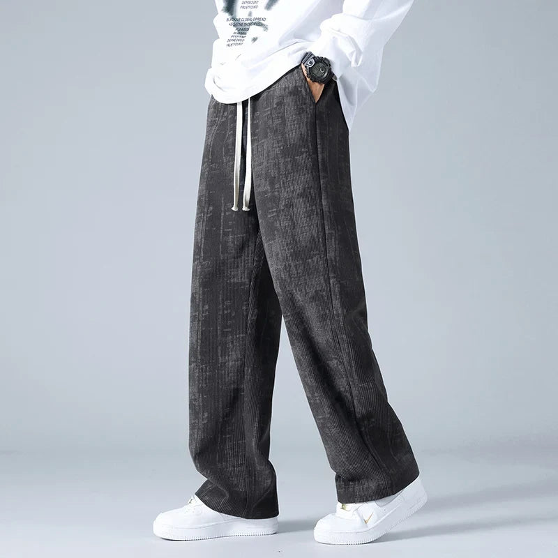 Unisex relaxed fit sweatpants in grey, perfect for ultimate comfort & casual athleisure style.