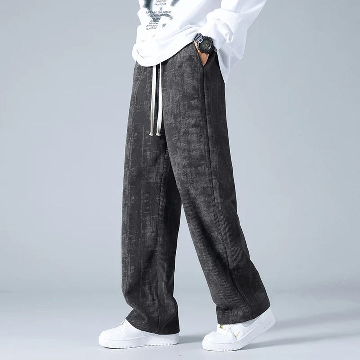 Unisex relaxed fit sweatpants in grey, perfect for ultimate comfort & casual athleisure style.