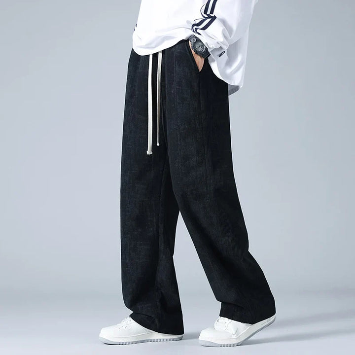 Comfortable unisex relaxed fit beige sweatpants, perfect for lounging or everyday casual style.