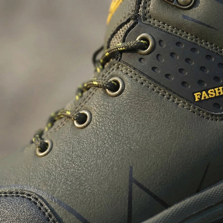 Durable lug sole on retro unisex ankle hiking boots, providing excellent grip for trail, work & outdoor adventures.