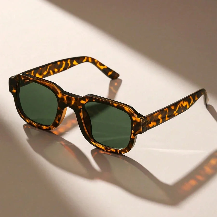 Unisex retro bold frame sunglasses offering UV protection. Stylish fashion eyewear for eye protection and statement.