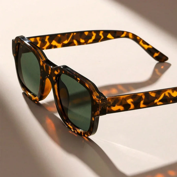 Statement style retro bold frame sunglasses. Unisex shades providing effective UV protection and eye protection.
