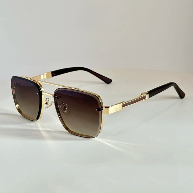 Gold accented retro-modern square sunglasses, unisex eyewear for ultimate sun protection & style.