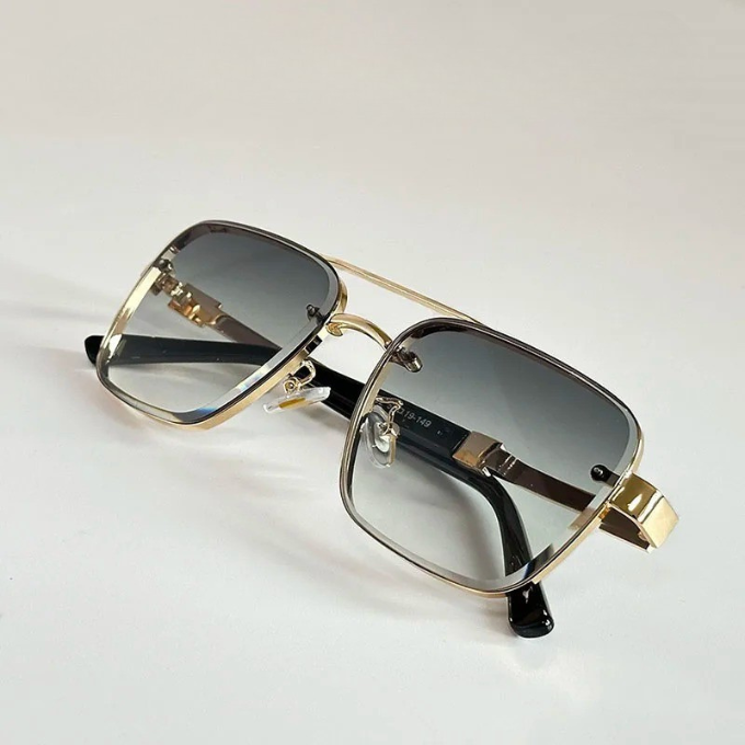 Retro-modern square sunglasses with gold details & UV protection for men & women, stylish eyewear.