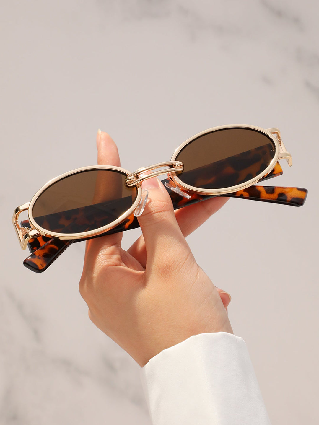 Durable retro modern sunglasses, designed for stylish UV protection & long-lasting wear.