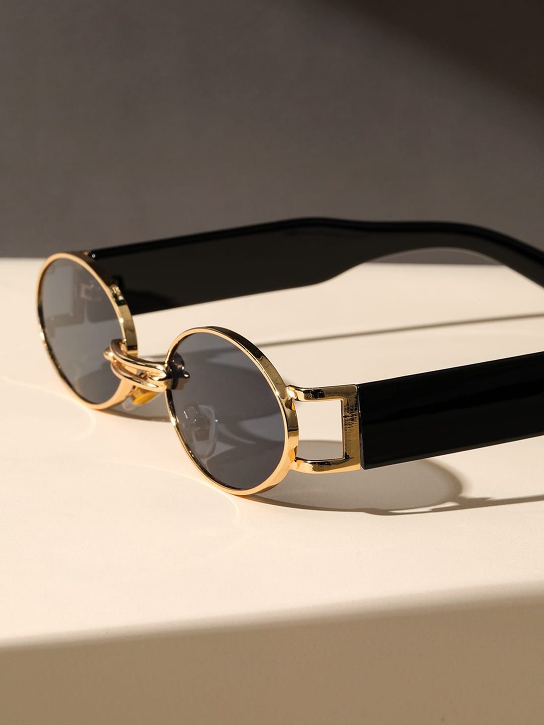 Stylish unisex shades blending retro charm with modern design and essential UV protection.