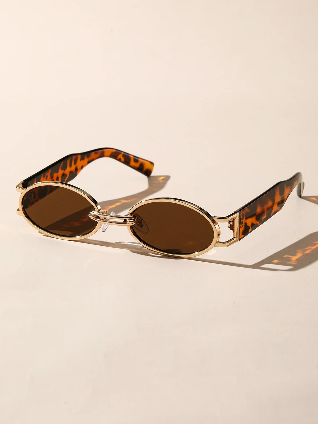 Trendsetting unisex shades, blending retro aesthetics with modern UV protection features.