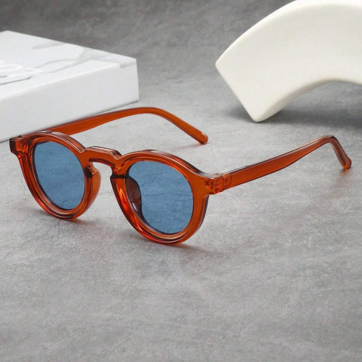 Premium unisex retro sculpted round sunglasses, acetate frames providing UV eye protection.