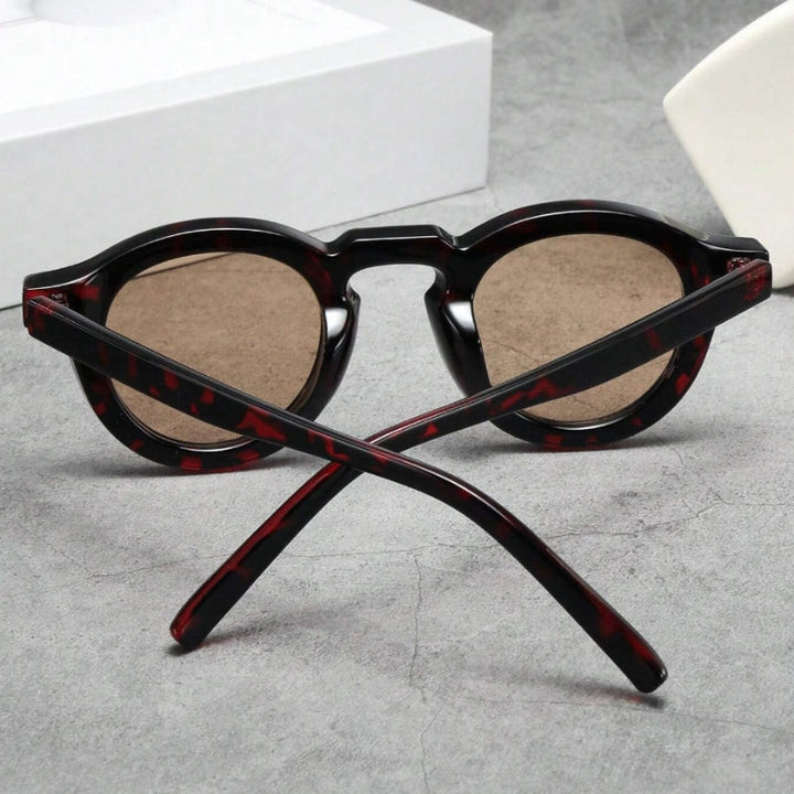Stylish unisex retro round shades, sculpted design for a vintage look & sun protection.