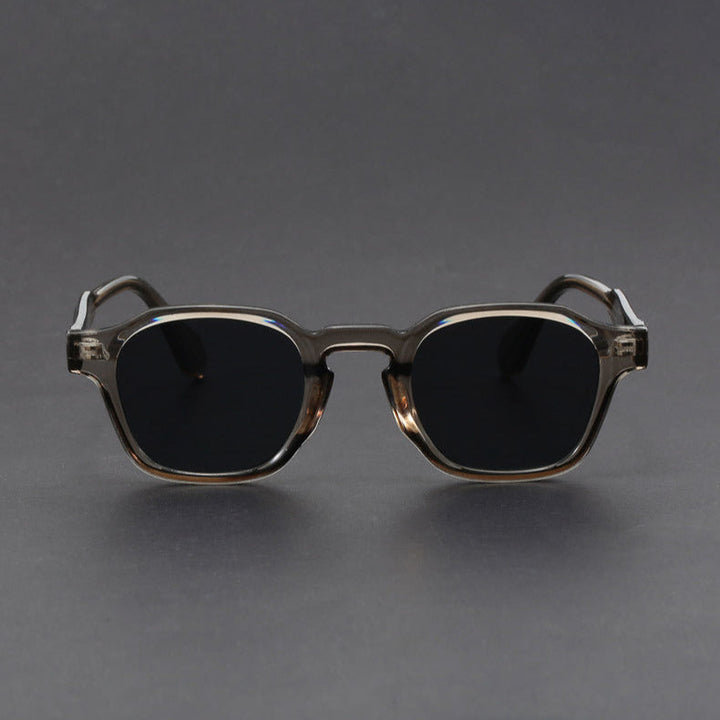 Unisex retro square sunglasses in a close-up, highlighting the durable frame and UV protection lenses.