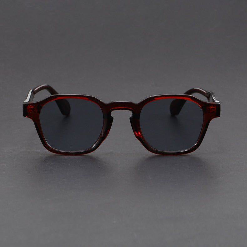 Black retro square unisex sunglasses with anti-glare lenses. Essential UV protection, vintage fashion.