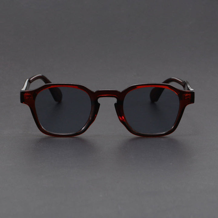 Black retro square unisex sunglasses with anti-glare lenses. Essential UV protection, vintage fashion.