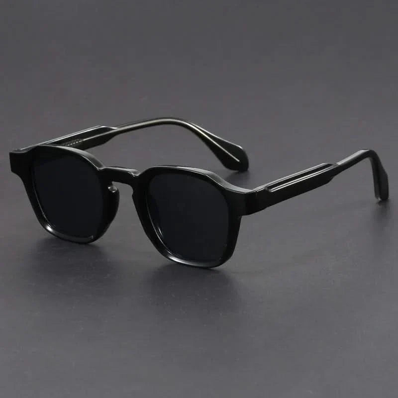 Durable polycarbonate retro square sunglasses. Lightweight unisex design with anti-glare & UV protection.