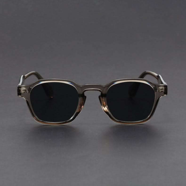 Polycarbonate retro square sunglasses offering UV protection. Lightweight & durable for unisex classic style.