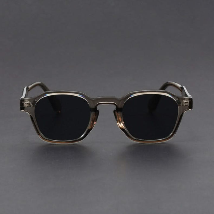 Polycarbonate retro square sunglasses offering UV protection. Lightweight & durable for unisex classic style.